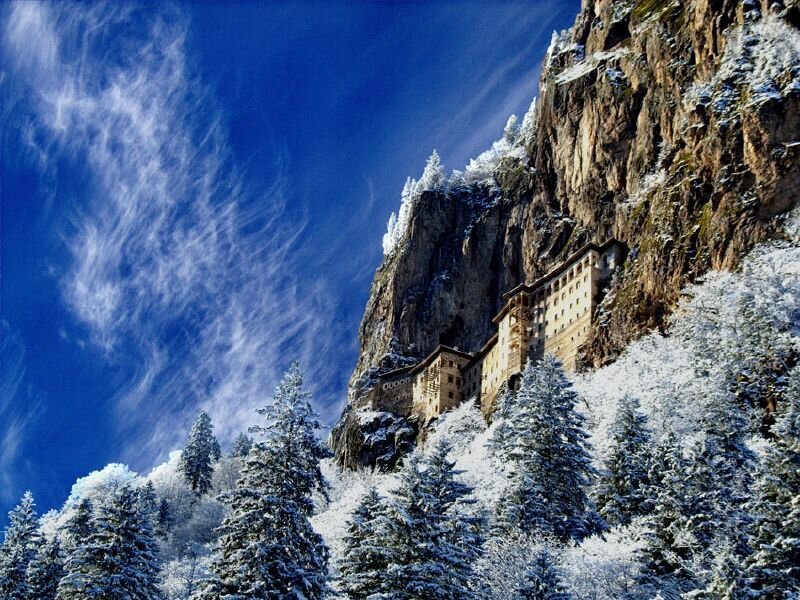 Monastery on a snowy cliff
