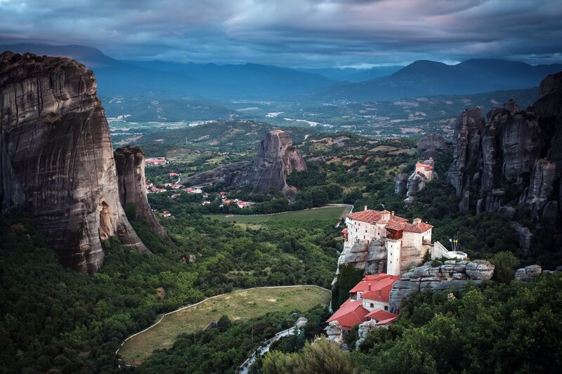 Monastery on Rock Formation — Green, Dramatic