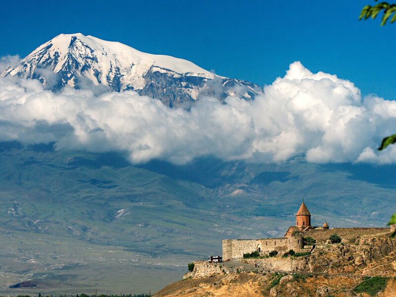 Monastery with snow-capped mountain