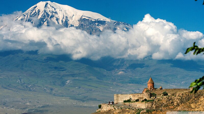 Monastery with snow-capped mountain