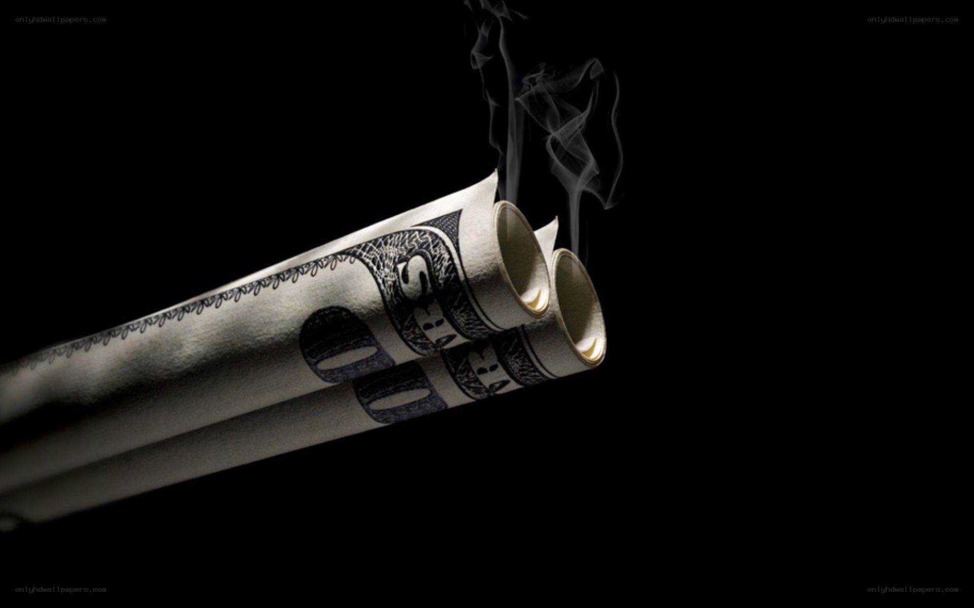 money rolled into guns