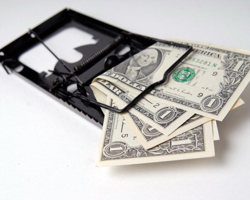 Money trapped in a mousetrap