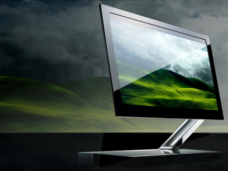 Monitor displaying green hills