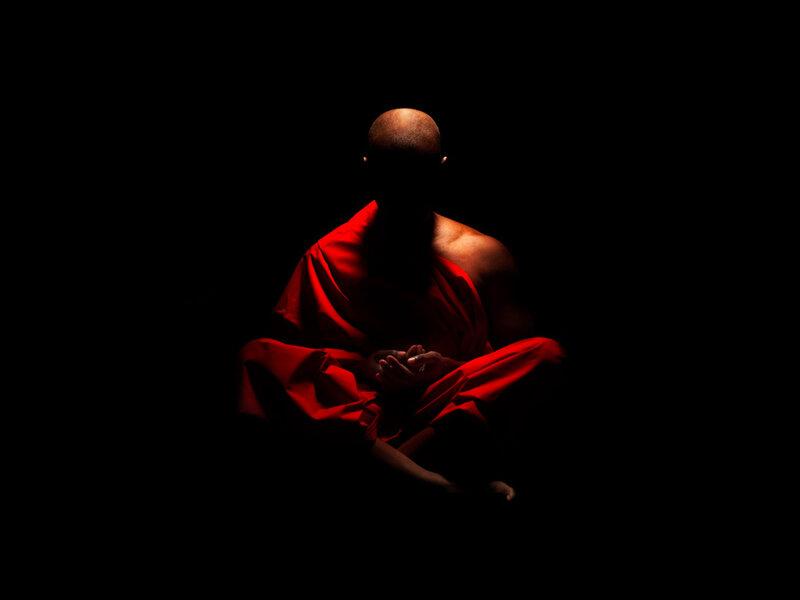 Monk in Red Robe — Dramatic, Night, Photograph