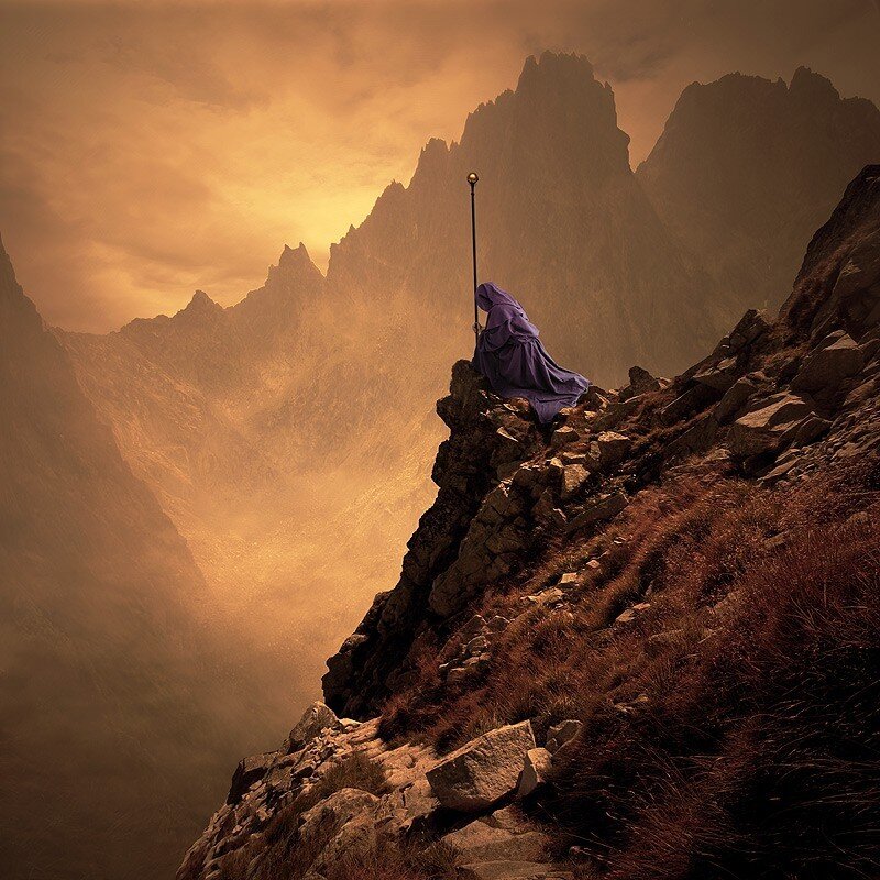 Monk on a mountain peak