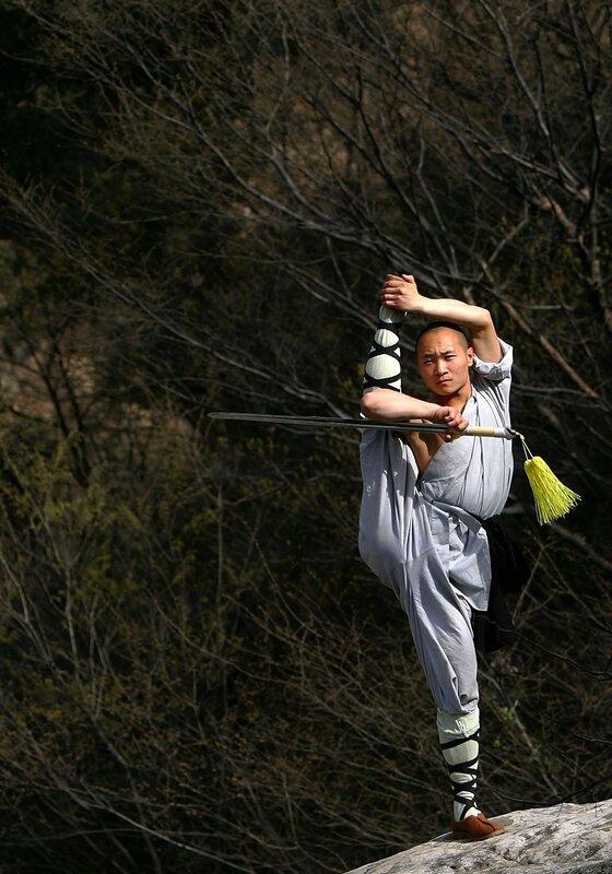 Monk practicing martial arts