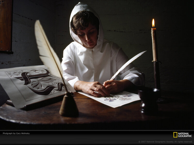 monk writing with quill