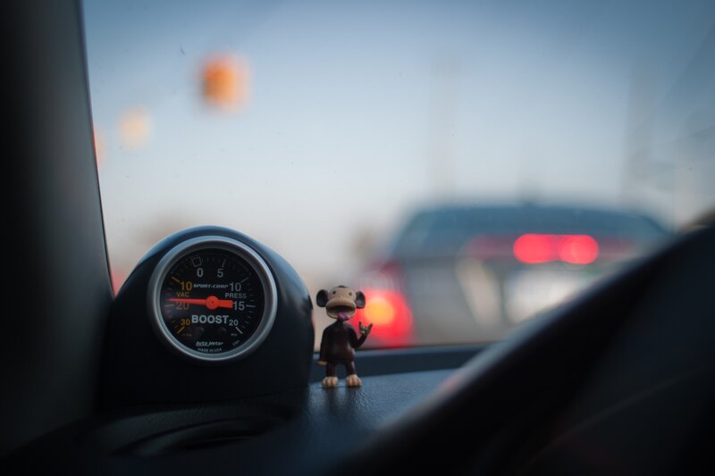 Monkey Figurine on Dashboard