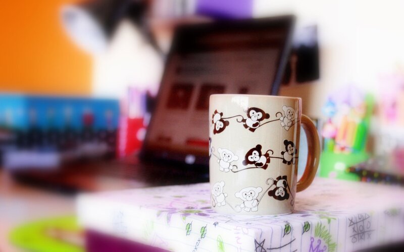 Monkey mug on a desk