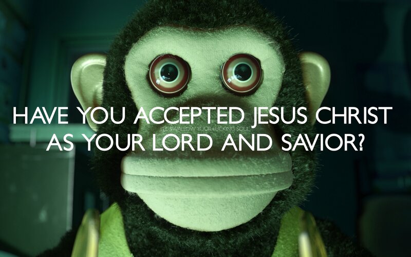 monkey puppet with religious text