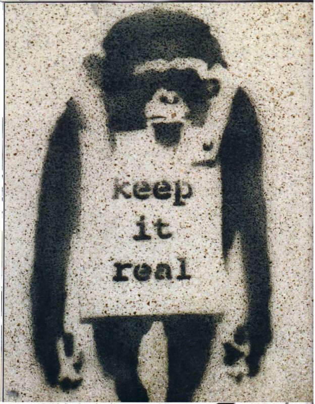 monkey with 'keep it real' text