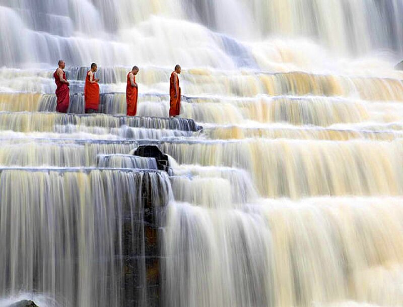 Monks at Waterfall — Red