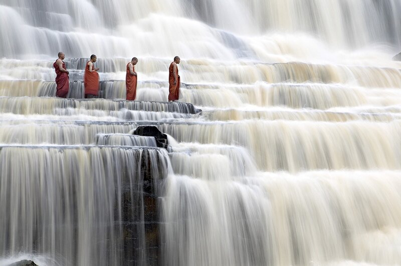 Monks at Waterfall — White, Serene