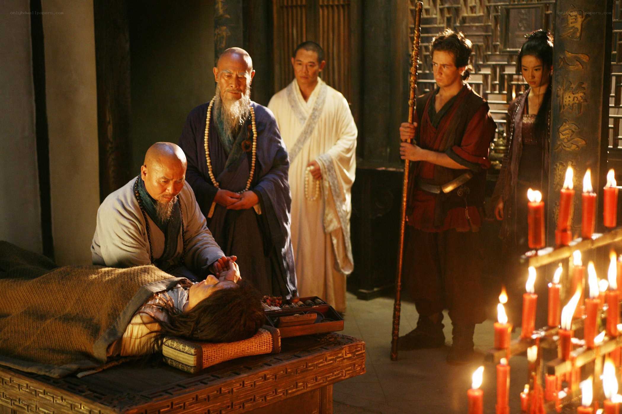Monks attending to a sick person