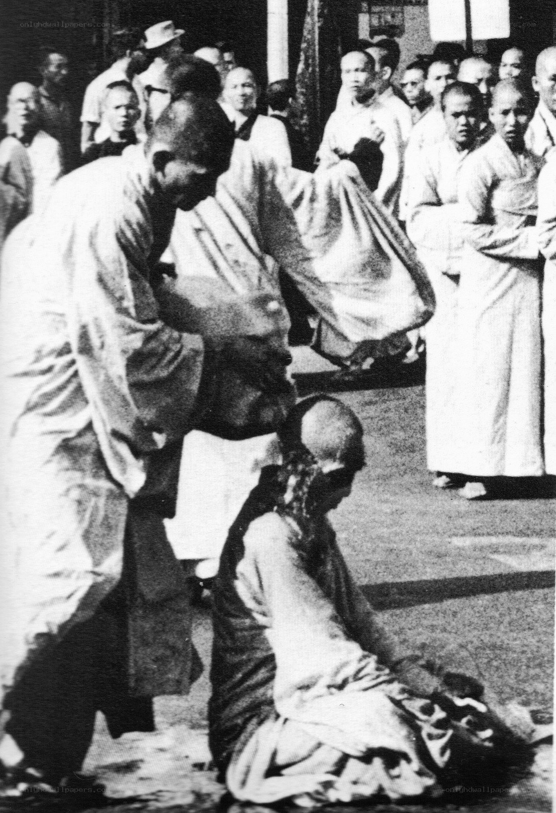 Monks in a public gathering
