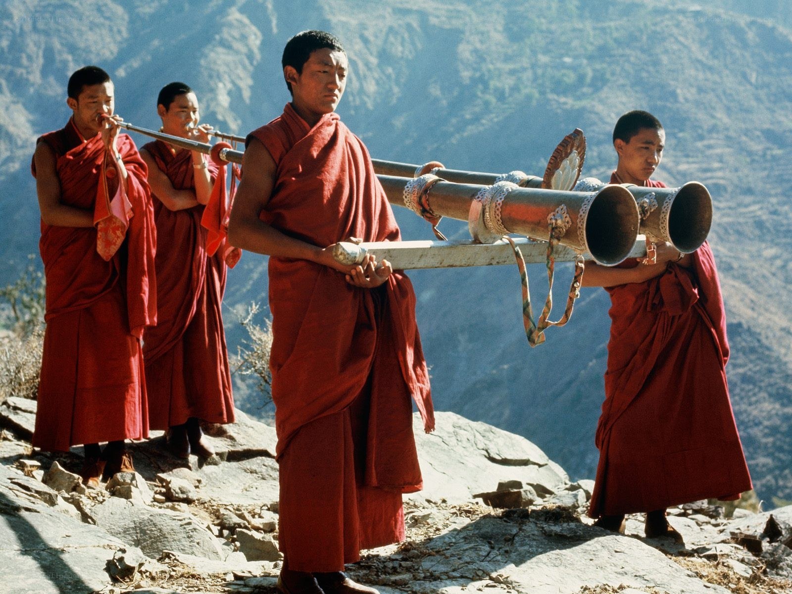 Monks playing ceremonial horns