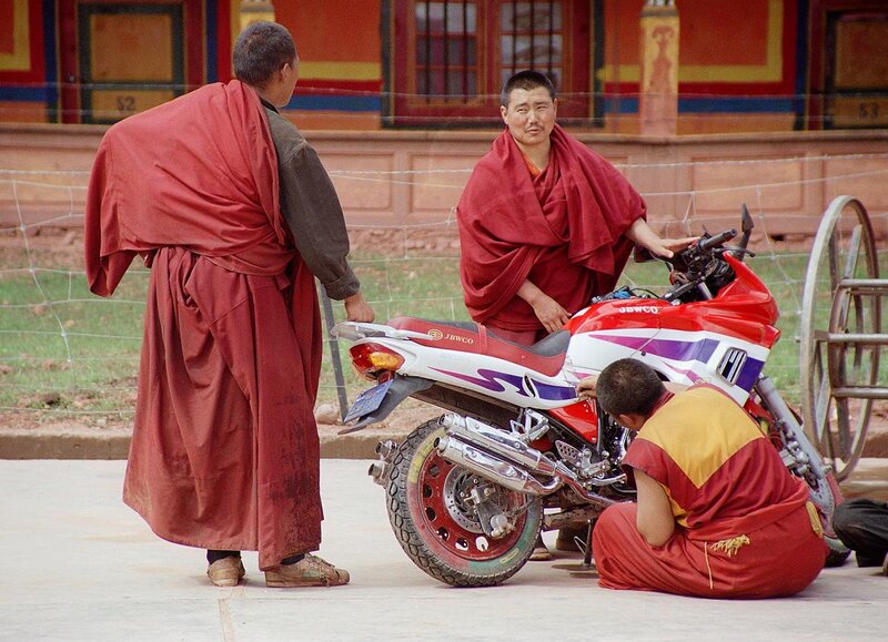 Monks with a motorcycle