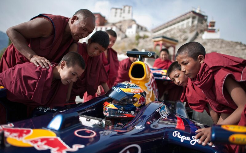 Monks with a race car