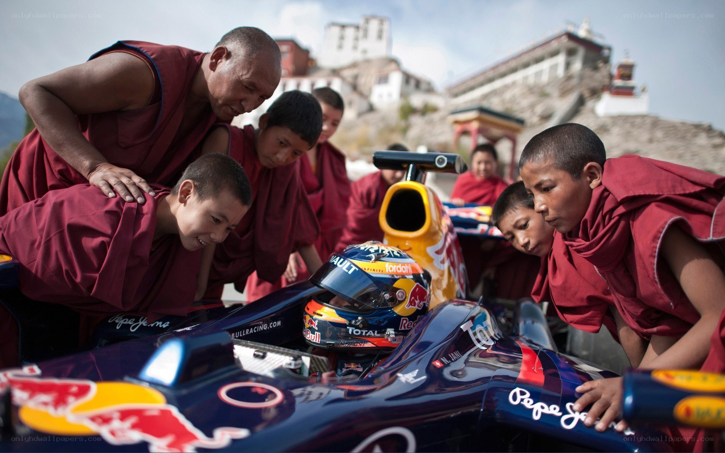 Monks with a race car