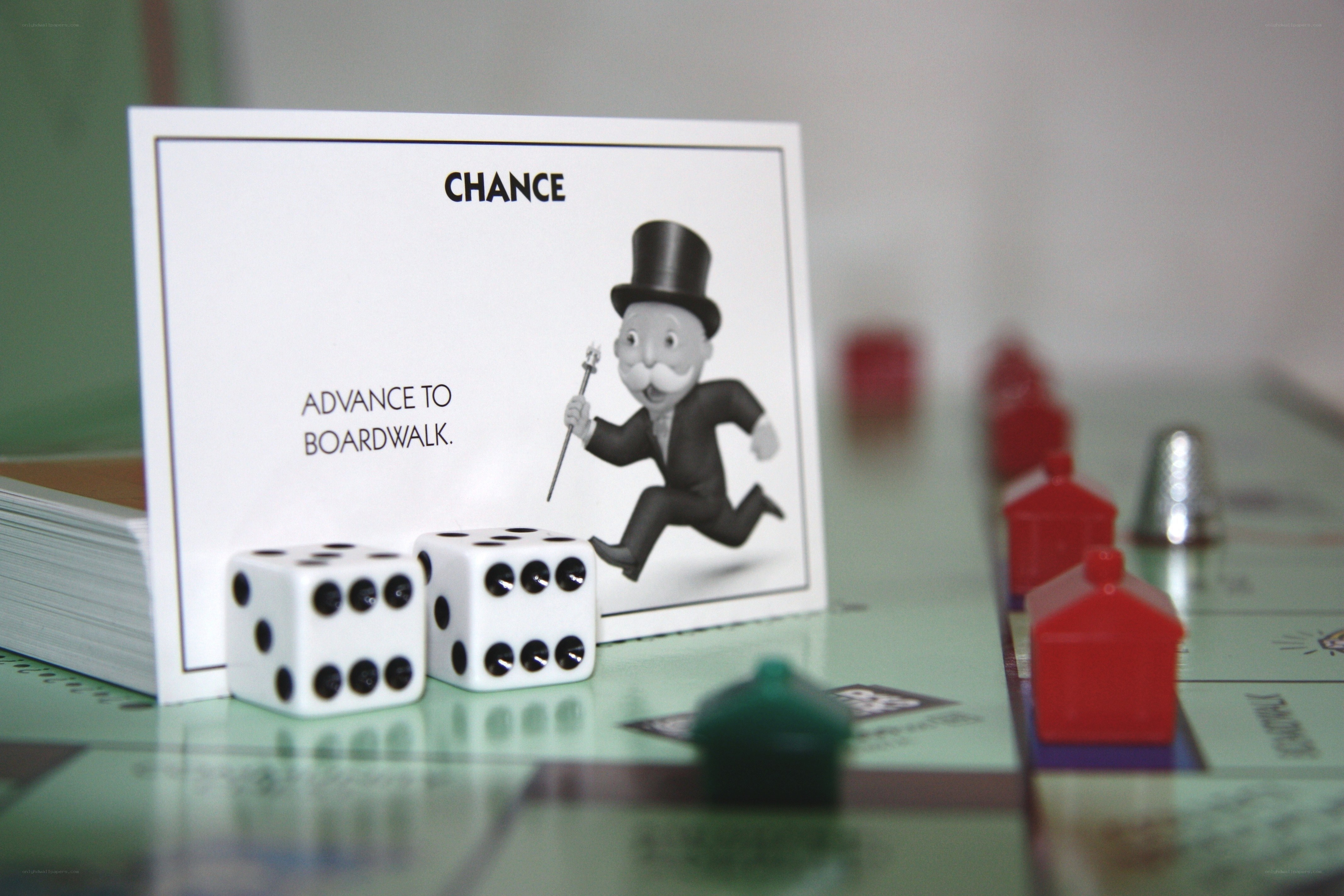 Monopoly chance card and dice