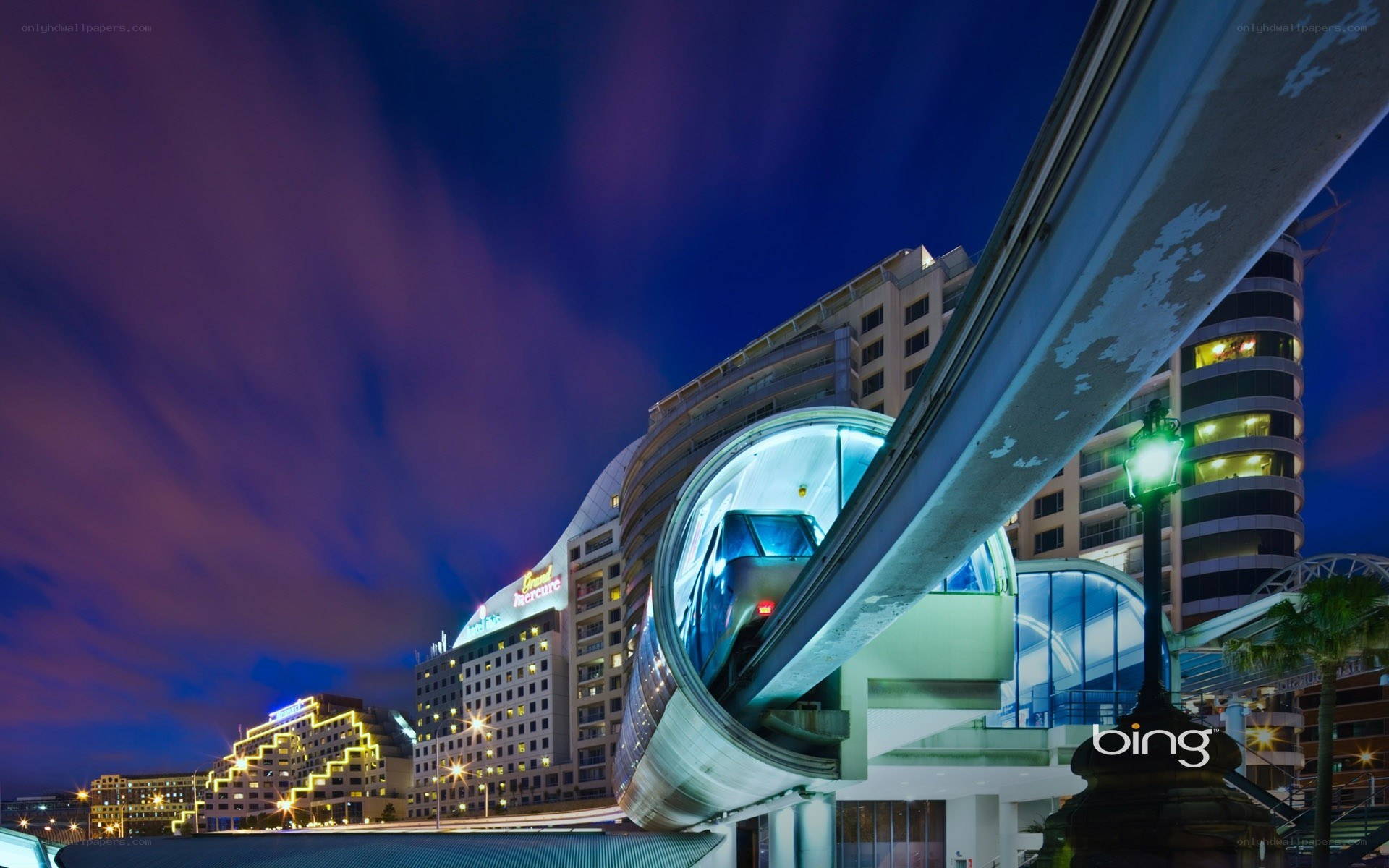 Monorail at night in a city