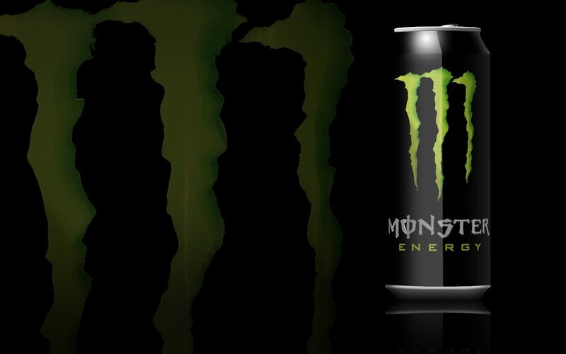 Monster Energy can on black background