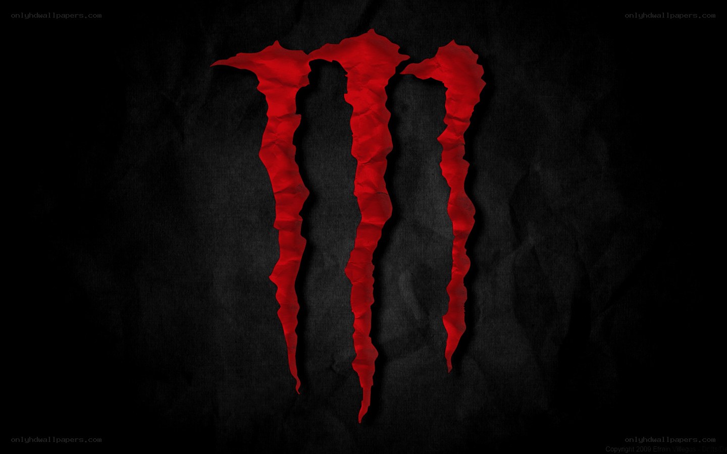 Monster Energy logo on dark background
