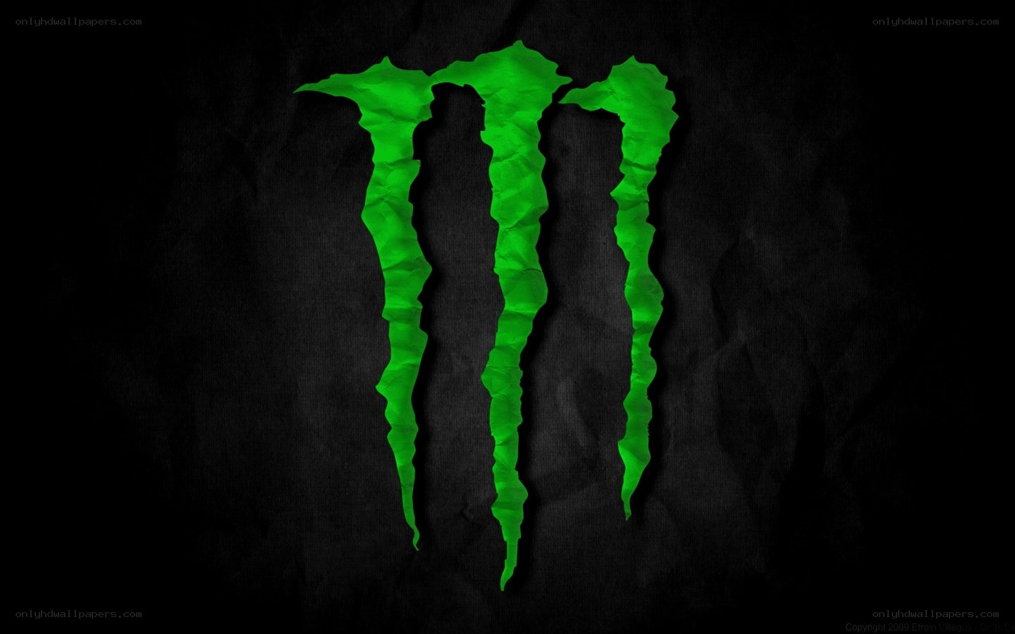 Monster Energy logo on dark background