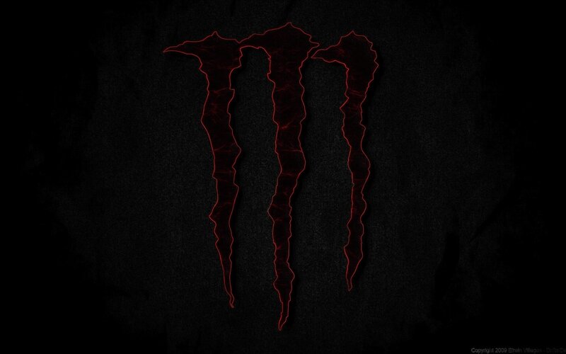Monster Energy logo on dark background