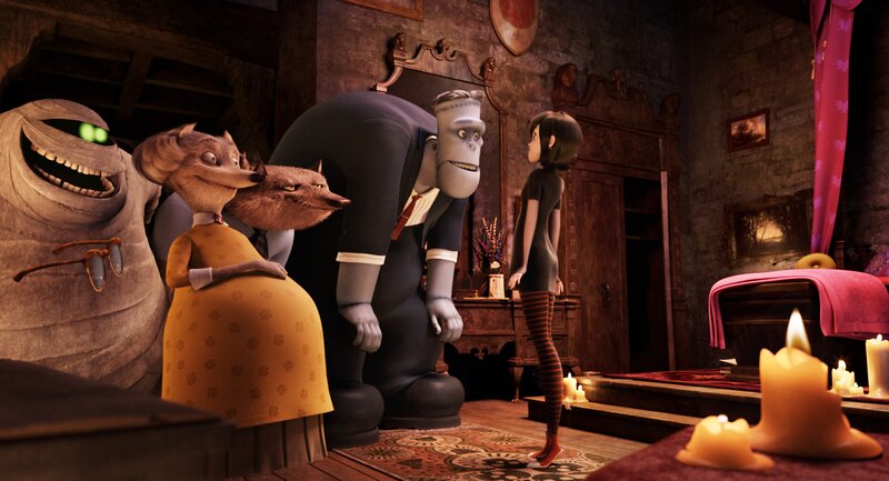 Monster family in a spooky room