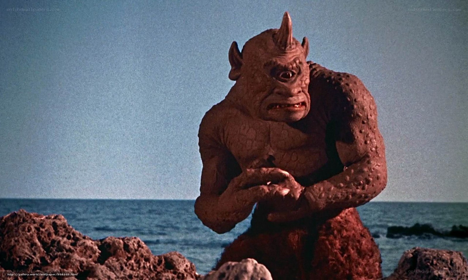 monster on rocky shore