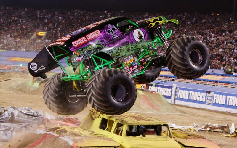 Monster Truck in Mid-air — Green, Dramatic, Night, Photograph