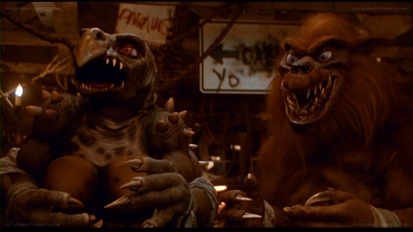 monsters in a dimly lit room