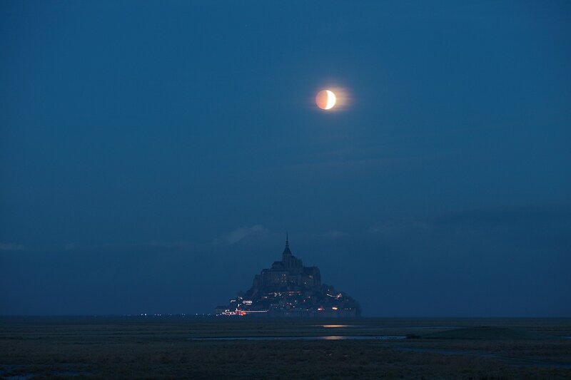 Mont Saint-Michel under a lunar eclipse