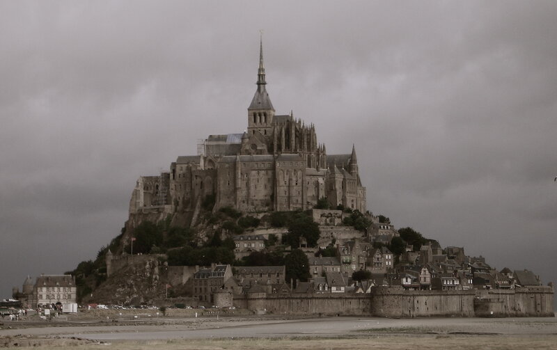Mont Saint-Michel under cloudy sky