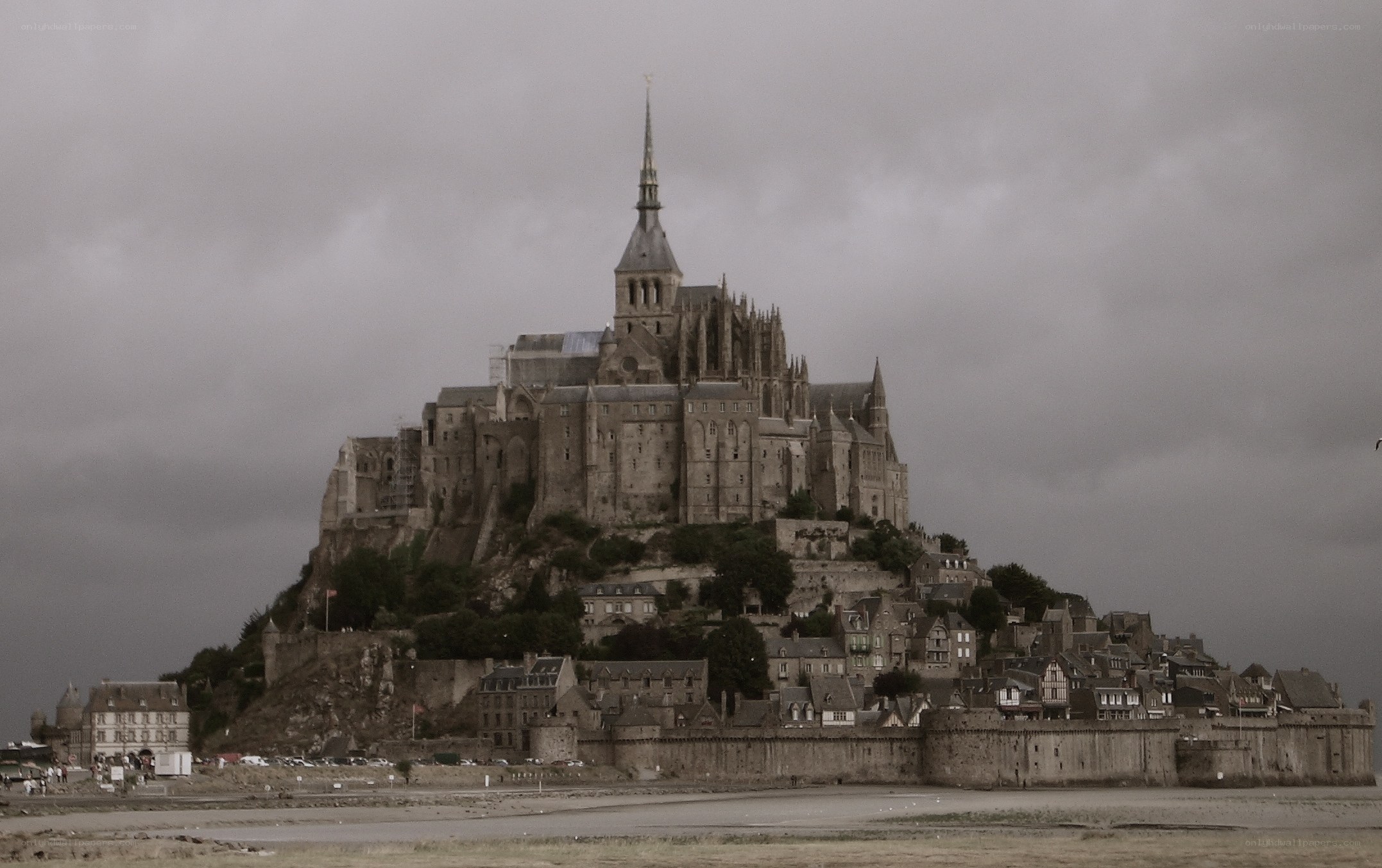 Mont Saint-Michel under cloudy sky
