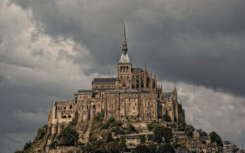 Mont Saint-Michel under stormy sky