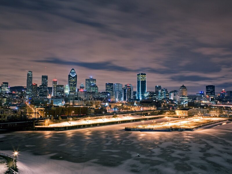 Montreal Skyline at Night — Black, Dramatic, Photograph, Skyscraper, Frozen River, City Lights