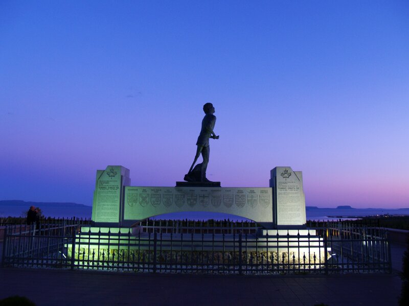 monument at dusk by the water