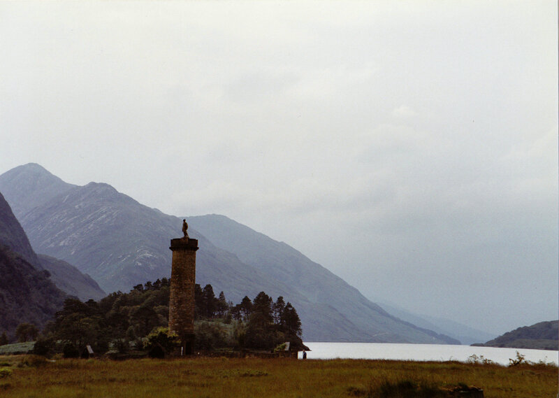 Monument by a lake in Scotland