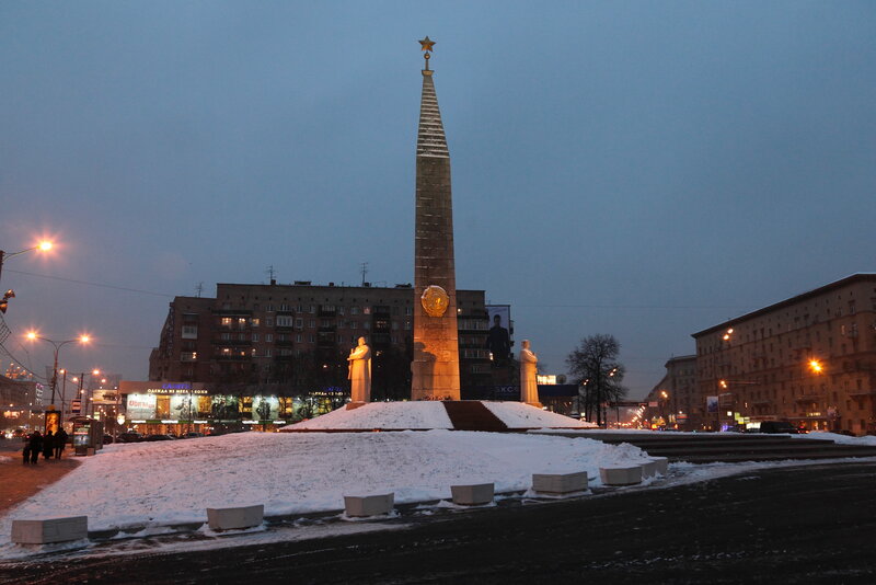 Monument in snowy city square