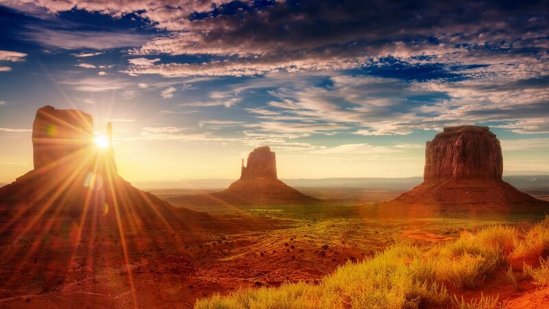 Monument Valley Buttes — Orange, Dramatic, Sunset, Photograph, Sun, Clouds, Desert
