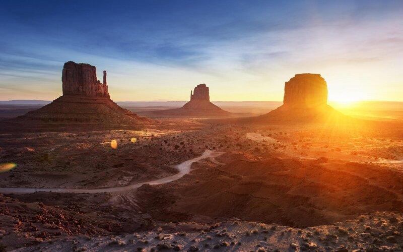Monument Valley Buttes — Orange, Serene, Sunrise