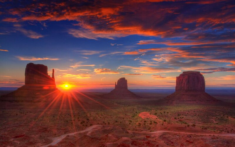 Monument Valley Buttes — Red, Dramatic, Sunrise