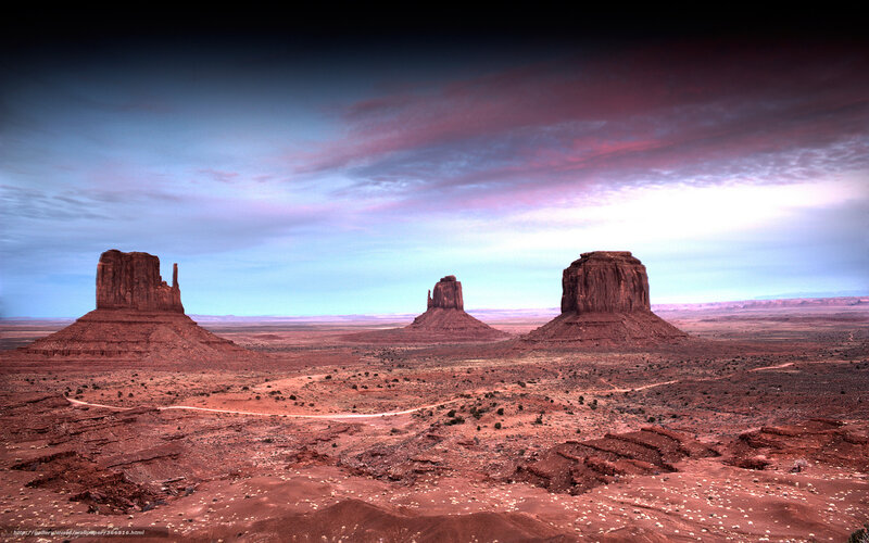 Monument Valley Rock Formations — Red, Dramatic, Sunset