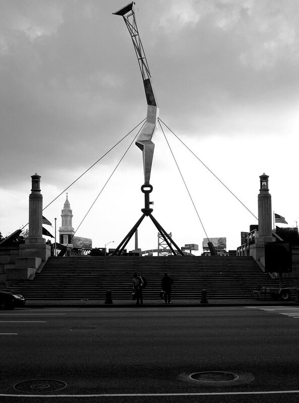 Monumental sculpture at bridge entrance