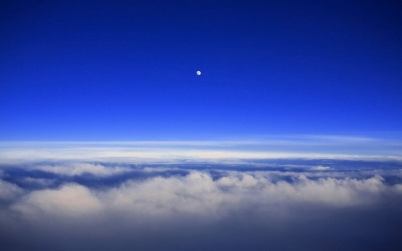 Moon Above Clouds — Photograph