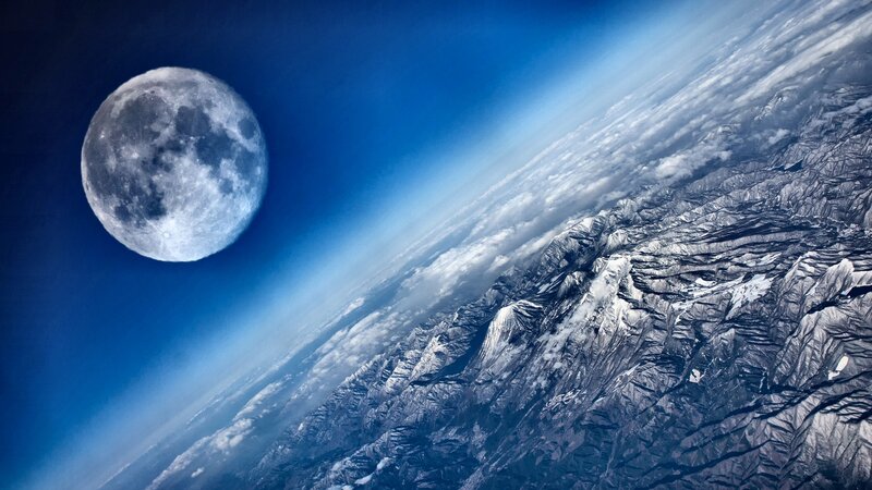 Moon Above Mountain Range