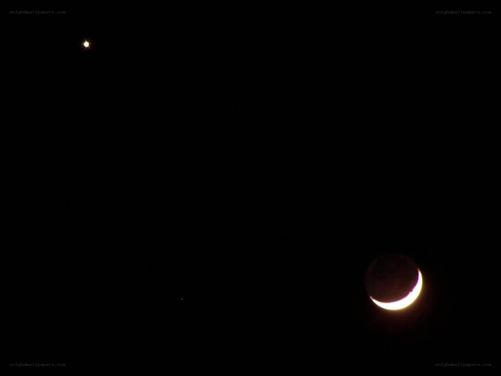 Moon and planet in night sky