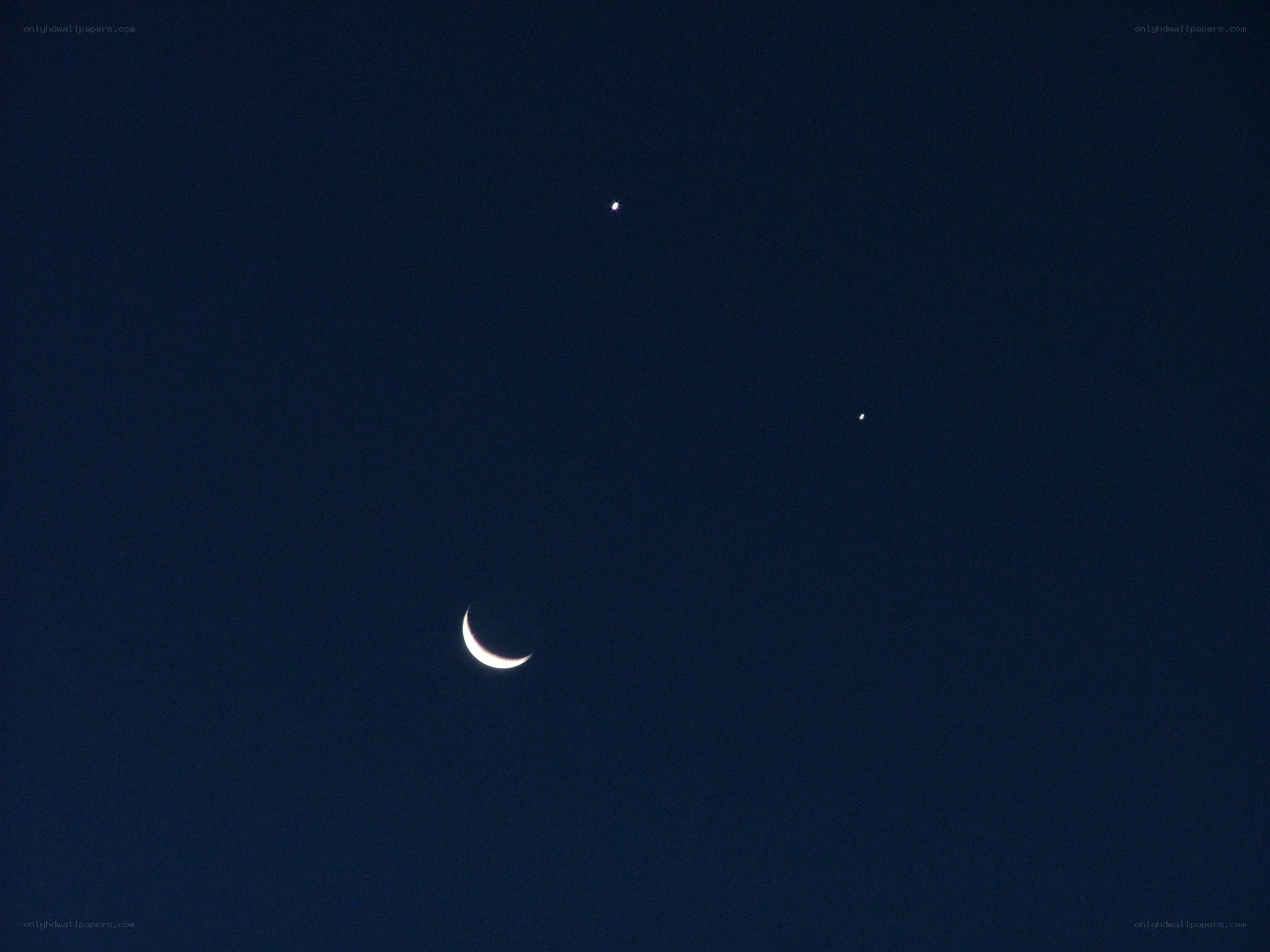 Moon and planets in night sky